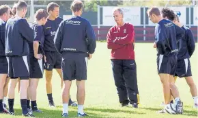  ??  ?? Rainer Bonhof passes on his knowledge to Scotland’s Under-21s