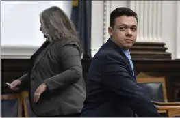  ?? SEAN KRAJACIC — THE KENOSHA NEWS VIA AP ?? Kyle Rittenhous­e, right, looks on as the jury is let out of the room during a break during his trail at the Kenosha County Courthouse in Kenosha, Wis., on Monday.
