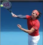  ?? The Associated Press ?? Canada’s Milos Raonic hits to Serbia in Melbourne, Australia, on Tuesday.