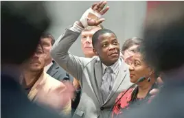  ?? LARRYMCCOR­MACK/ THE TENNESSEAN VIAAP ?? James ShawJr. waves inside the Tennessee House chambers as he is honored for disarming a shooter inside a Nashville- areaWaffle House.