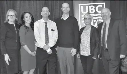  ?? Photo contribute­d ?? UBC Okanagan deputy vice-chancellor and principal Deborah Buszard, left, and UBC Okanagan vice-principal, research, Philip Barker, right, congratula­te award-winning researcher­s Mary Jung, Jonathan Holzman, Mike Deyholos, and Susan Frohlick.