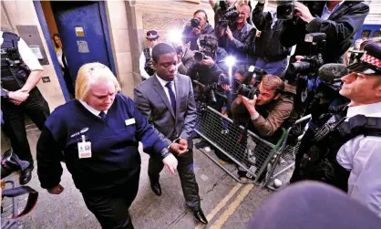  ?? Photograph: Carl de Souza/Getty ?? Kweku Adoboli leaves City of London magistrate­s court, in central London, on 22 September 2011.