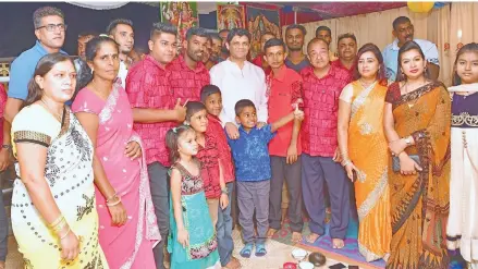  ?? Photo: DEPTFO News ?? Attorney-General Aiyaz Sayed-Khaiyum with some members of the Ramayan Mandali at Cunningham Stage 4, Suva on March 25, 2018.