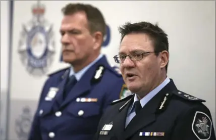  ?? RICK RYCROFT, THE ASSOCIATED PRESS ?? Australian Federal Police deputy commission­er Michael Phelan, right, discusses details of the alleged plot to bring down a plane.