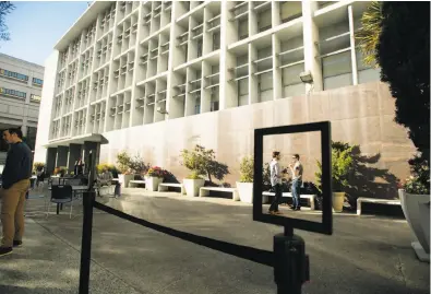  ?? Photos by Noah Berger / Special to The Chronicle ?? Left: UC Hastings law students Brandon Shiener (right) and Felipe Pereira outside Snodgrass Hall, a 1953 facility that will be demolished.