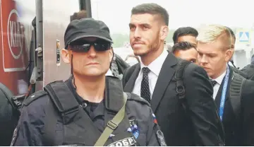  ??  ?? New Zealand’s defender Michael Boxall (centre) and teammates arrive at Pulkovo Internatio­nal Airport in Saint Petersburg ahead of the FIFA Confederat­ions Cup football tournament in Russia. — AFP photo