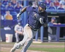  ?? CHRIS O’MEARA – THE ASSOCIATED PRESS ?? The Rays’ Manuel Margot heads for first base en route to a two-run triple during a seven-run 11th inning against the Blue Jays on Monday.