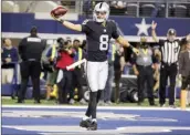  ?? AP photo ?? Raiders quarterbac­k Marcus
Mariota celebrates after scoring on a 3-yard run in the third quarter Thursday.