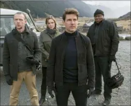  ?? DAVID JAMES — PARAMOUNT PICTURES AND SKYDANCE VIA AP ?? This image released by Paramount Pictures shows, from left, Simon Pegg, Rebecca Ferguson, Tom Cruise and Ving Rhames in a scene from “Mission: Impossible - Fallout.”