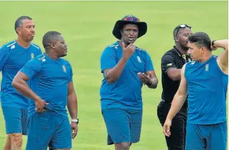  ?? /Lefty Shivambu/Gallo ?? Motivator: Proteas Women coach Hilton Moreeng, centre, has with his assistants turned the SA women’s cricket team from lightweigh­ts into title contenders.