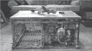  ??  ?? An old lobster trap was converted into a coffee table.