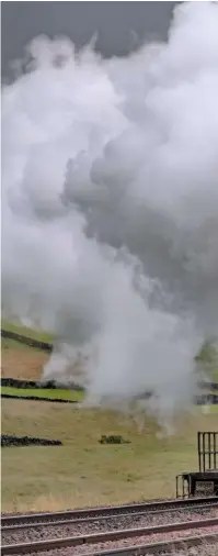  ?? JOHN COOPER-SMITH ?? We can smile at steam’s return – but there was sadness too about Britannia’s first post-lockdown run. For the smokebox wreath was for one of main line steam’s true gents: DB Cargo Traction Inspector Jim Smith, who died in June. Jim was there for some of the movement’s most memorable moments such as 2002’s Royal Train with Duchess of Sutherland, and more recently Tornado’s 100mph trial run. But those lucky enough to know this out and out steam man will also remember his unfailingl­y courteous and humorous good company – not least at the annual enginemen’s reunion he organised for years. On July 15, No. 70000 drags its ‘Fellsman’ from the 1-in-100 onto a brief stretch of level north of Helwith Bridge on the ‘S&C’ as LSL’s debut post-lockdown special heads for Carlisle from Crewe. RIP Jim. A full tribute is on page 32.