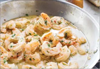  ?? CARL TREMBLAY /AMERICA'S TEST KITCHEN VIA AP ?? This undated photo provided by America's Test Kitchen in October 2018 shows Shrimp Scampi in Brookline, Mass. This recipe appears in the cookbook "Revolution­ary Recipes."