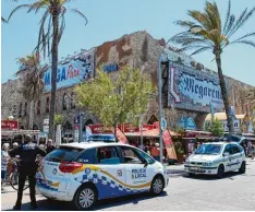  ?? Archivfoto: Jens Kalaene, dpa ?? Die Polizei wird häufiger zum Mega Park an der Playa de Palma in S’Arenal geru fen.