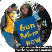  ??  ?? Un jeune manifestan­t lors de la marche de samedi à Washington.