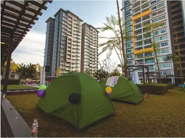  ??  ?? Skyvilla residents can pitch tents in the compound for a family camping experience.