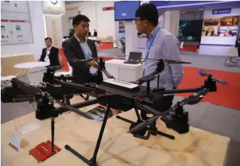  ??  ?? A drone on show at a security equipment technology and product expo in Beijing last week EPA