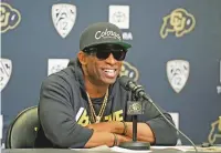  ?? DAVID ZALUBOWSKI/THE ASSOCIATED PRESS ?? “The roster’s really talented,” Colorado head coach Deion Sanders said during a news conference Friday in Boulder, Colo. “I love going to practice each day witnessing the battles that we have at certain positions.”