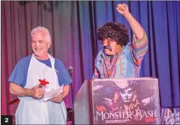  ?? Tammy Murga/The Signal (See additional photos at signalscv.com) ?? 1) Lindsay and Brian Schlick of Schlick Art receive the Rising Star Award from Valley Industry Associatio­n during the 2018 VIA Monster BASH event Friday. 2) Kevin MacDonald, SCV Senior Center executive director, left, and Assemblyma­n Dante Acosta present the VIA Rising Star award event Friday. 3) The ballroom at the Hyatt Regency Valencia had various Halloween decoration­s. Various community members and business leaders showed up dressed in costumes. 2