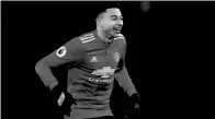  ?? LEE SMITH / ACTION IMAGES VIA REUTERS ?? Jesse Lingard is all smiles after scoring for Manchester United against Everton on Monday.