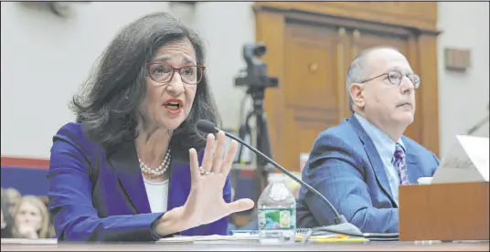  ?? Alex Wong Getty Images ?? President of Columbia University Nemat Shafik, left, and David Schizer, right, dean emeritus, testify Wednesday before a House committee at the Rayburn House Office Building in Washington.