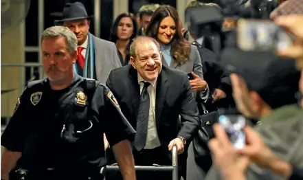  ?? AP ?? Harvey Weinstein leaves court during his rape trial in New York.