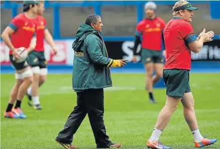  ?? Picture: GETTY IMAGES ?? FIGHTING FOR PRIDE: Springbok coach Allister Coetzee, centre and captain Adriaan Strauss, right, get to work during training ahead of their internatio­nalagainst Wales at Cardiff Arms Park in Cardiff, Wales, this week