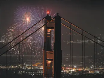  ?? Carlos Avila Gonzalez / The Chronicle 2018 ?? Fireworks burst over downtown San Francisco on July 4, 2018. Fireworks, parades and holiday fun are scheduled all over the Bay Area this year.