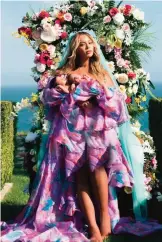  ??  ?? In this undated image Beyonce poses with her newborn twins Sir Carter and Rumi. — AP