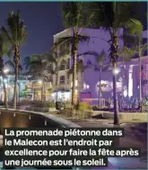  ?? ?? La promenade piétonne dans le Malecon est l’endroit par excellence pour faire la fête après une journée sous le soleil.