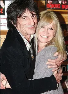  ??  ?? LOVE IN VAIN: With Ronnie Wood. Now, 12 years after divorce, Jo, left, wants a new romance