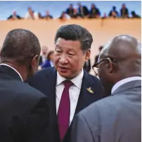  ?? (John Macdougall/Reuters) ?? CHINESE PRESIDENT Xi Jinping talks to Guinean President and Chairman of the African Union Alpha Conde (left) and South Africa’s President Jacob Zuma at the G-20 meeting in Hamburg, Germany, last week.