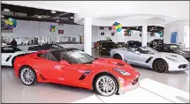  ??  ?? In this April 24, 2017 photo, Chevrolet Corvettes are displayed in the showroom at Quirk Auto Dealers in Manchester, New Hampshire. (AP)