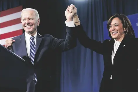  ?? PATRICK SEMANSKY/AP ?? PRESIDENT JOE BIDEN AND VICE PRESIDENT KAMALA HARRIS stand on stage at the Democratic National Committee winter meeting on Feb. 3 in Philadelph­ia. A majority of Democrats now think one term is plenty for Biden, despite his insistence that he plans to seek reelection in 2024. That’s according to a new poll from The Associated PRESS-NORC Center for Public Affairs Research.