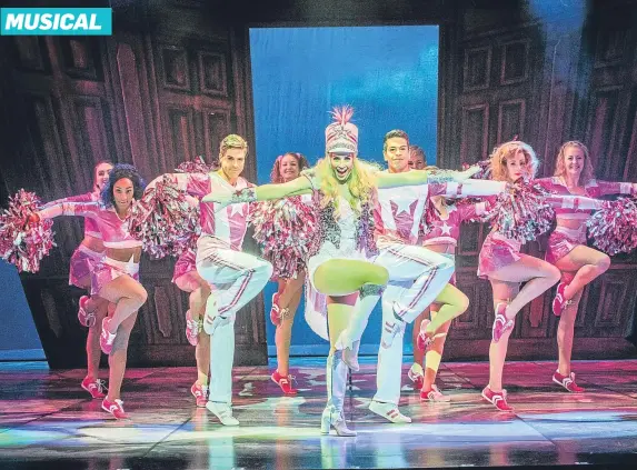  ??  ?? Lucie Jones as Elle Woods, centre, strutting her stuff with the dancers on stage
