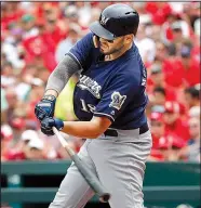  ?? AP/JEFF ROBERSON ?? Mike Moustakas’ two-run double in the third inning produced all of the runs the Milwaukee Brewers needed to defeat the St. Louis Cardinals 2-1 on Sunday in St. Louis.