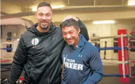  ??  ?? John Parker (right) was diagnosed with a brain aneurysm in the build-up to brother Joseph’s unificatio­n fight against Anthony Joshua. Photo /
Doug Sherring