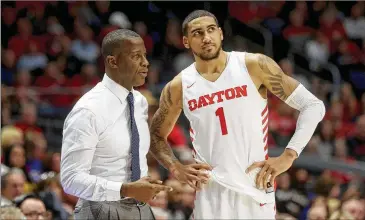  ?? TONY TRIBBLE / AP ?? Dayton coach Anthony Grant has watched forward Obi Toppin have 157 dunks in less than two seasons. The Flyers’ ball movement gets defenses out of position and allows Toppin to slip behind for an alley-oop dunk.