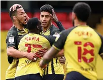  ??  ?? Watford stars thank goal hero Masina