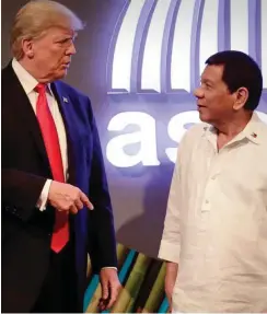  ?? Foto: AFP/Mark R. Cristino ?? Zwei sehr umstritten­e Präsidente­n: Trump und Duterte