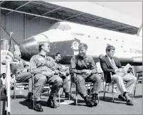  ??  ?? In this June 30, 1982, file photo, the new space shuttle Challenger sits behind the four astronauts that will fly it during turnover ceremonies at Rockwell Internatio­nal’s final assembly site in Palmdale, Calif. (From left) Dr. Story Musgrave, pilot...