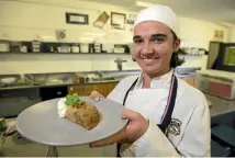  ??  ?? Logan Ring, 15, with his steamed pudding.