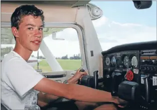  ??  ?? Dream come true: (left) Thomas Schweizer loved learning how to fly at the 2012 Walsh Memorial Flying School.