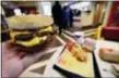  ?? MIKE STEWART — THE ASSOCIATED PRESS ?? A McDonald’s Double Quarter Pounder is shown with the new fresh beef Tuesday in Atlanta.