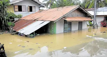  ?? —PHOTO FROM LOCAL GOVERNMENT OF IMELDA, ZAMBOANGA SIBUGAY ?? STILL FLOODED As of Saturday noon, the floodwater in Imelda, Zamboanga Sibugay, has yet to fully subside.