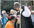  ??  ?? The Bishop of Gloucester at her official residence and, above, giving a blessing