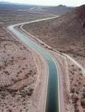  ?? ASSOCIATED PRESS ?? A Central Arizona Project canal stretches across the desert, bringing much-needed water from the Colorado River to Phoenix.