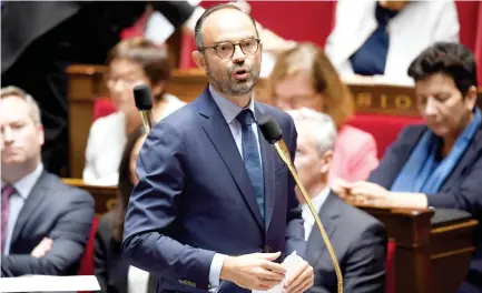  ??  ?? French Prime Minister Edouard Philippe addresses the Parliament on Tuesday at the National Assembly in Paris, as French lawmakers set to vote on a tough new counter-terrorism law. (AFP)