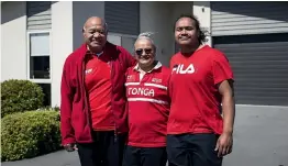  ?? ALDEN WILLIAMS / STUFF ?? From left: Siale, Milika and Tamatauton­u Faitotonu outside their new Rolleston home, near Christchur­ch.