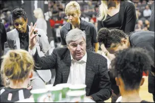  ?? Richard Brian Las Vegas Review-Journal @vegasphoto­graph ?? Aces coach Bill Laimbeer makes sure his players are on the same page during a timeout against the Indiana Fever on Saturday at Mandalay Bay Events Center.